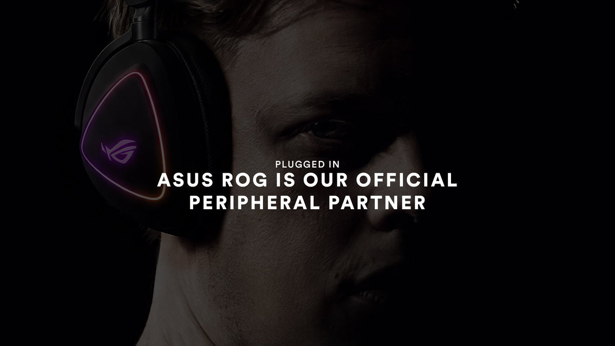 Close-up of someone in the dark wearing an ASUS ROG headset with a glowing ROG logo. Plugged in: ASUS ROG is our official peripheral partner.