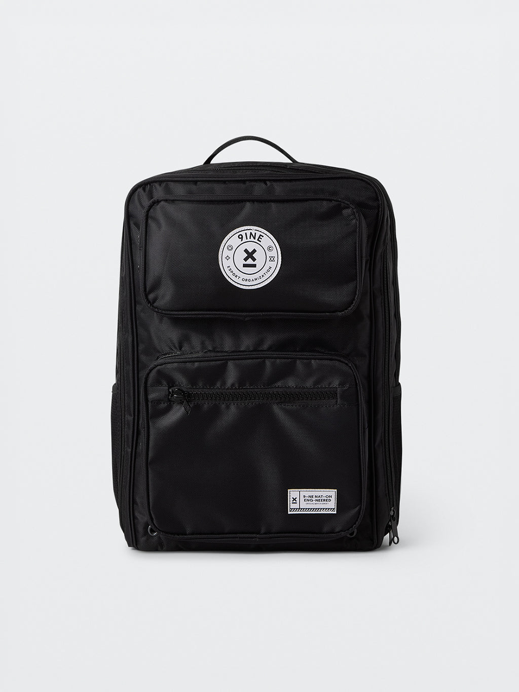 Front of the black 9INE Backpack with the round 9INE patch