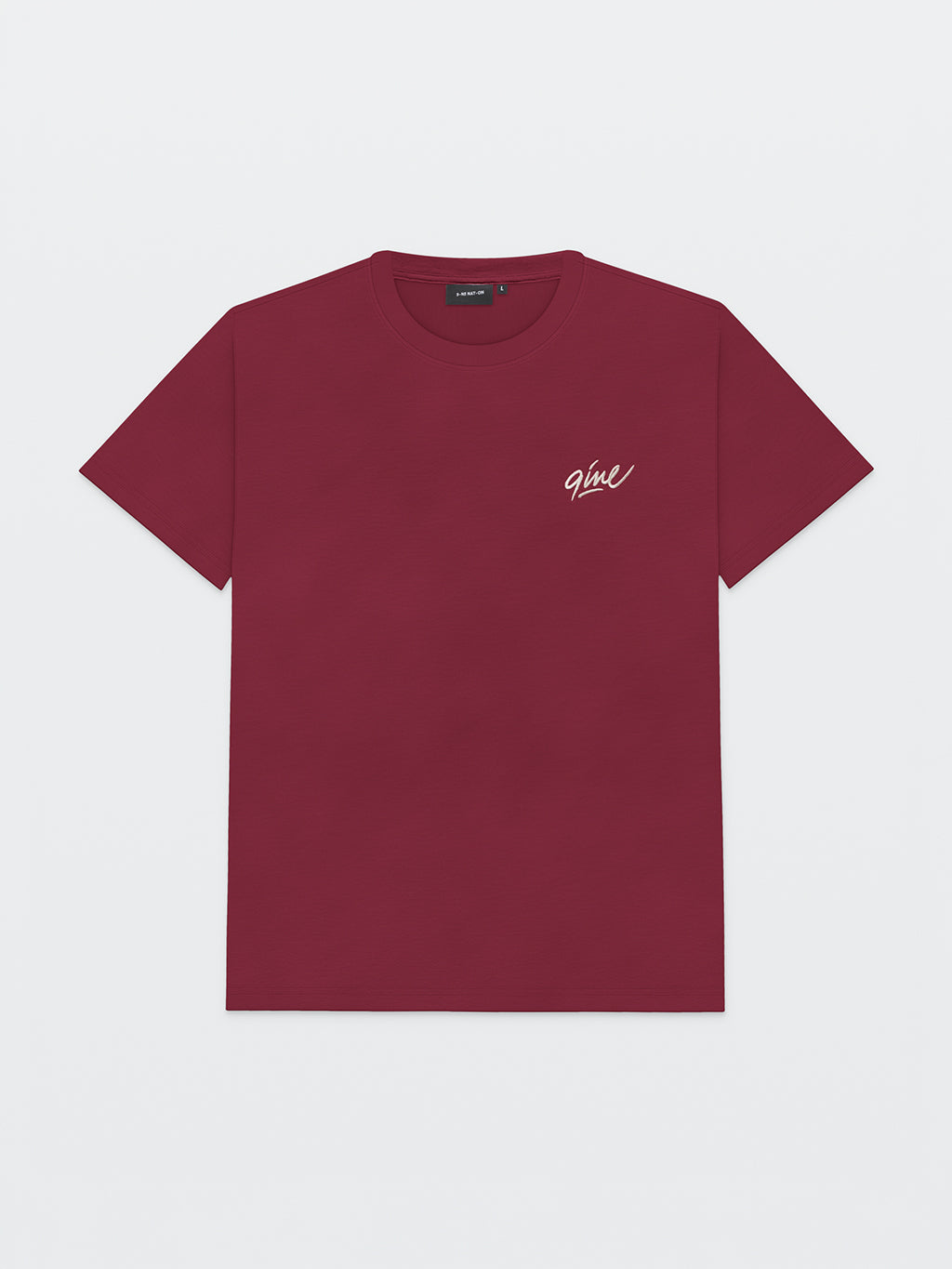 Front of the maroon 9INE Signature T-shirt with a small cream 9ine signature on the chest